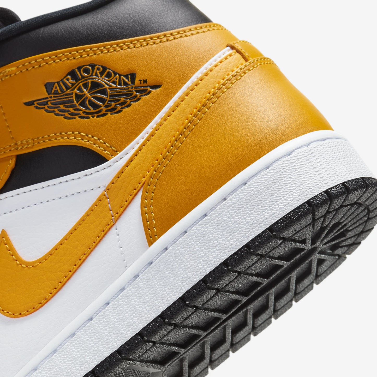 Jordan 1 Mid University Gold