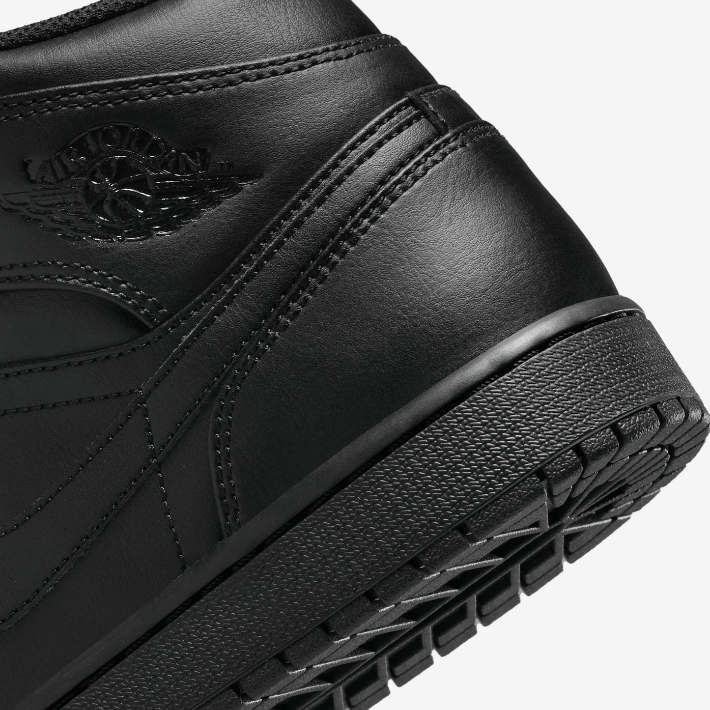 Jordan 1 Mid Triple Black