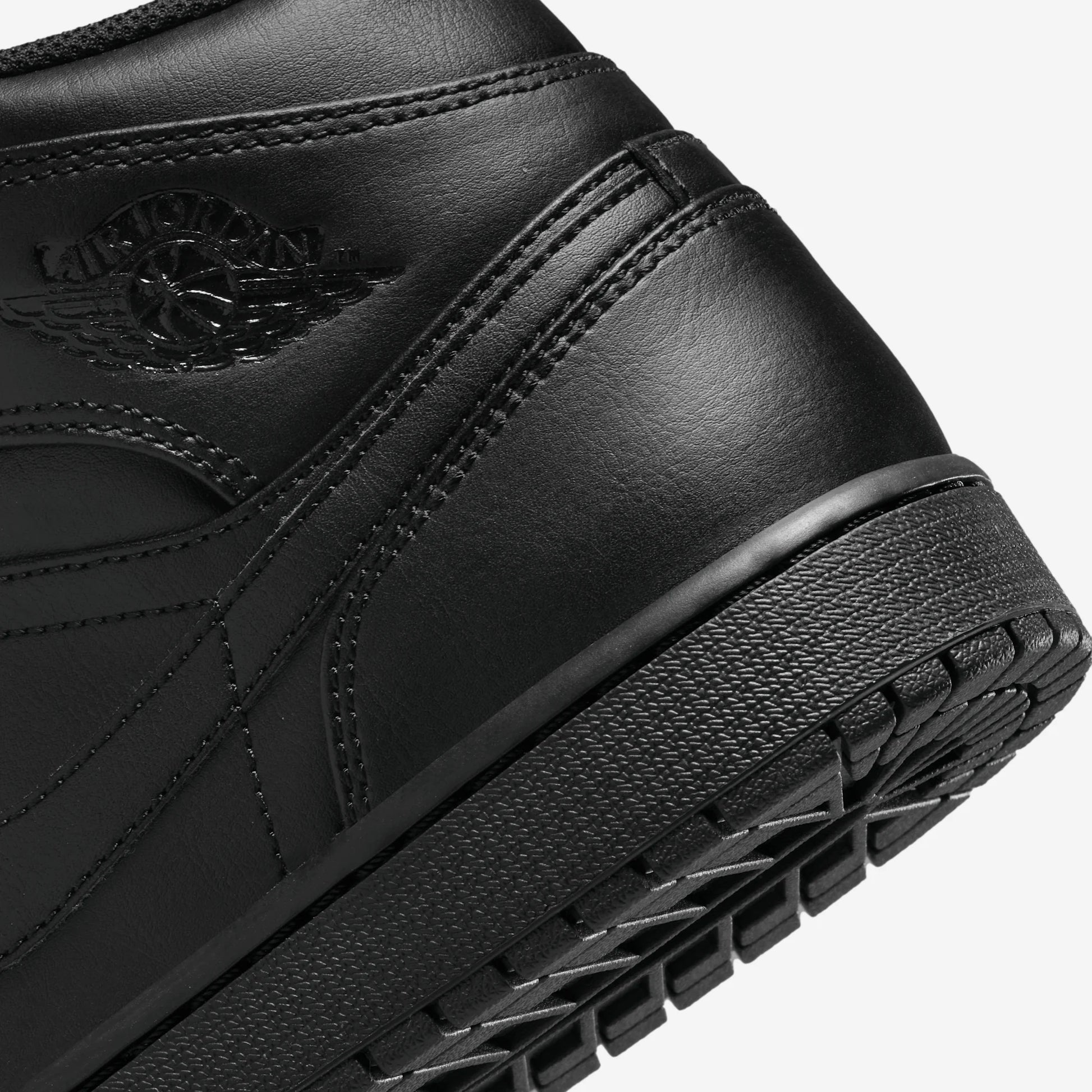Jordan 1 Mid Triple Black