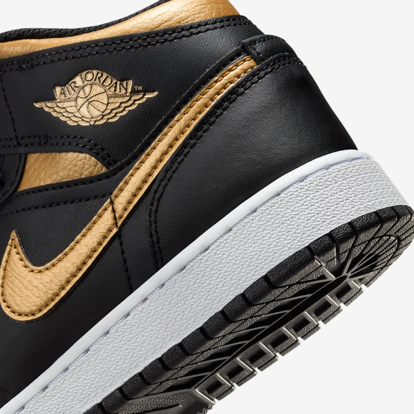 Jordan 1 Mid Black Metallic Gold Swoosh (GS)